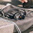 Sluchátka Aftershokz OpenComm před uši s mikrofonem, Bluetooth, šedá